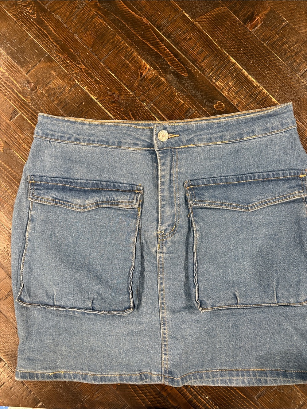 SHEIN Light Blue Denim Mini Skirt with Front Patch Pockets